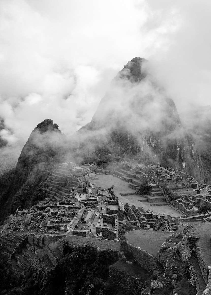 grayscale photo of mountain with smoke