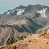 a mountain range with a road going through it