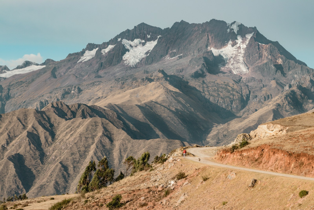 a mountain range with a road going through it